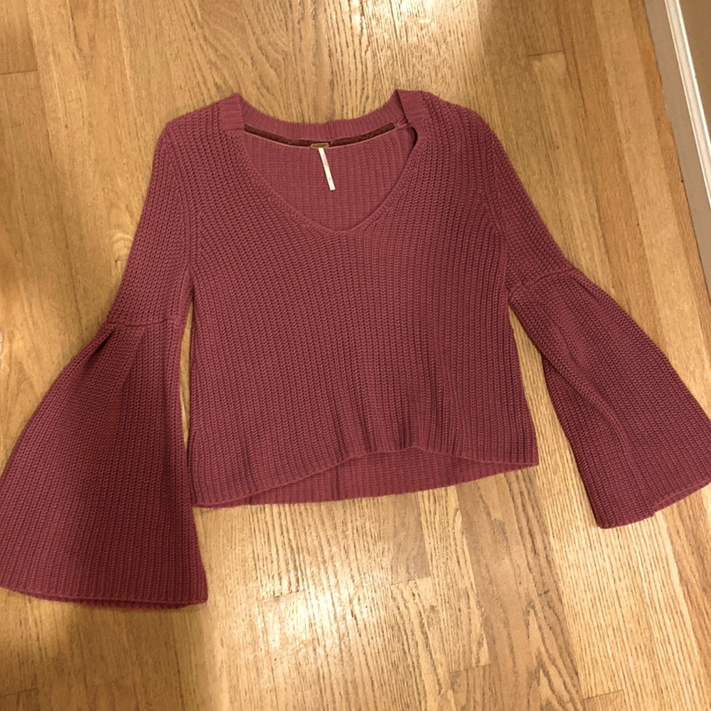 Free People knit cropped sweater with bell sleeves. Size small.